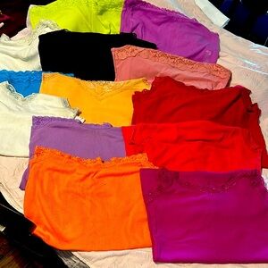 Tank tops with lace, assorted colors. Sixes Medium and Large.